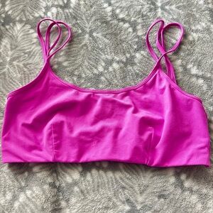 Hot pink Fabletics sports bra